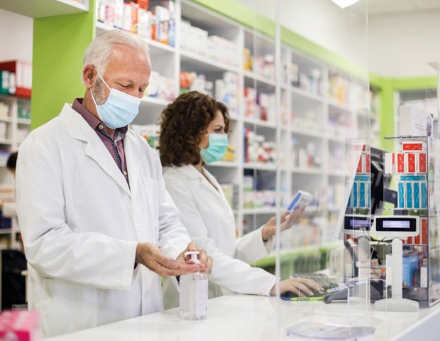 pharmacy team working behind counter_s.jpg